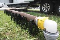 Camco Revolution RV Sewer Hose Kit in use